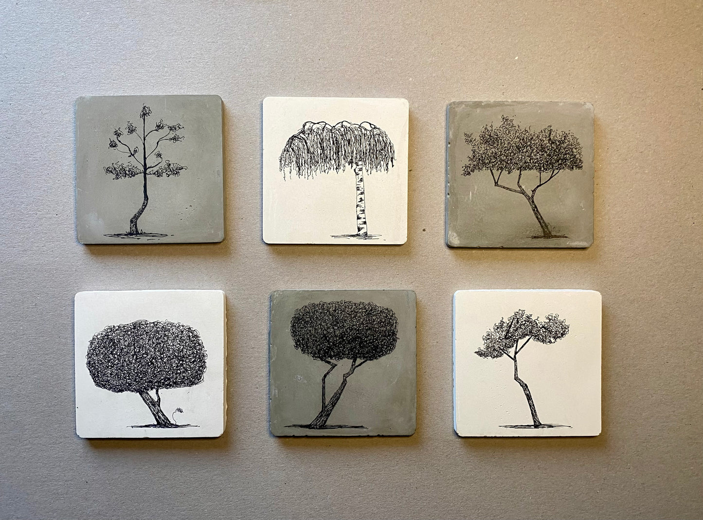 • Clapton Drooper – original tree drawing on cement tile by Warren Garland
• Hand-casted cement tile with ink drawing of tree – small artwork
• Unique tree art object from Lower Clapton by UK artist