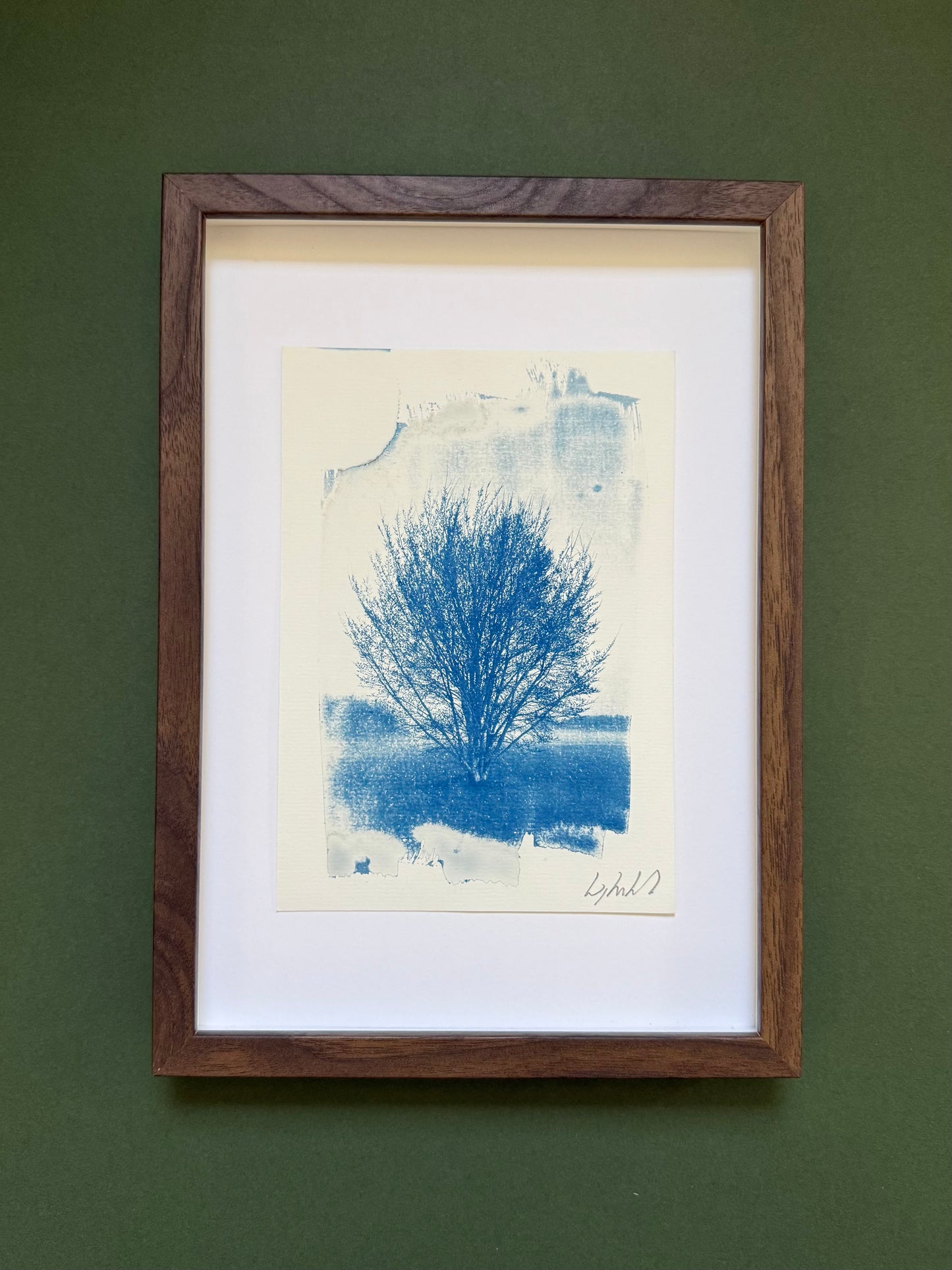 A5 Hackney Marshes cyanotype displayed with a white mount in a dark wooden frame.