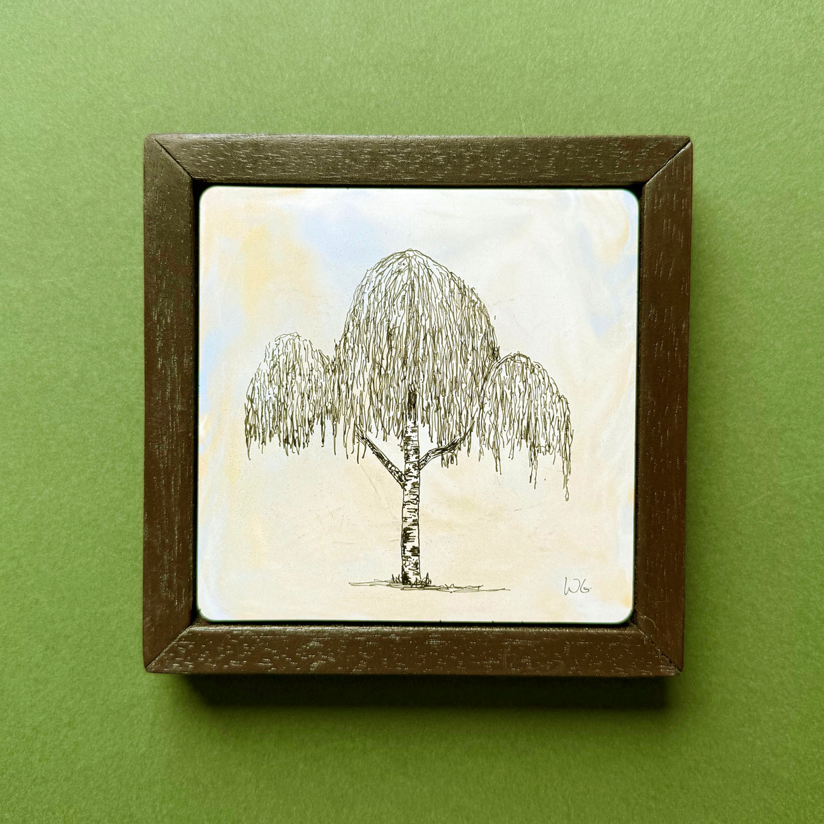 Original black ink drawing of a weeping tree from the New Forest, Hampshire, with long, delicate hanging branches and a rounded canopy. Drawn on hand-cast pigmented Portland cement with subtle blue and cream tones, presented in a dark wooden frame against a green background.