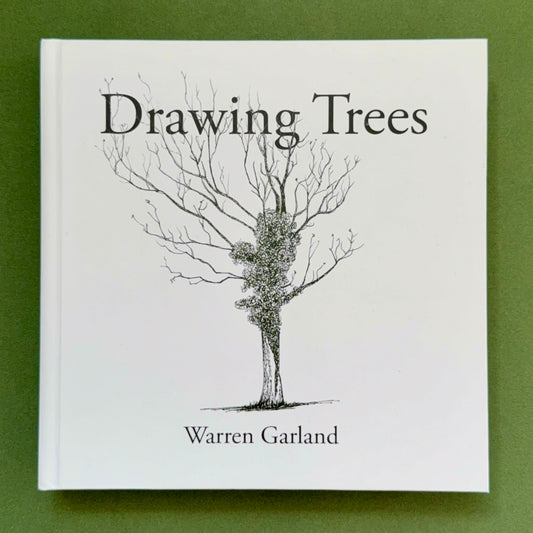 The front cover of the book 'Drawing Trees' by Warren Garland, featuring a black ink sketch of a leafless tree on a white background, set against a solid green backdrop.