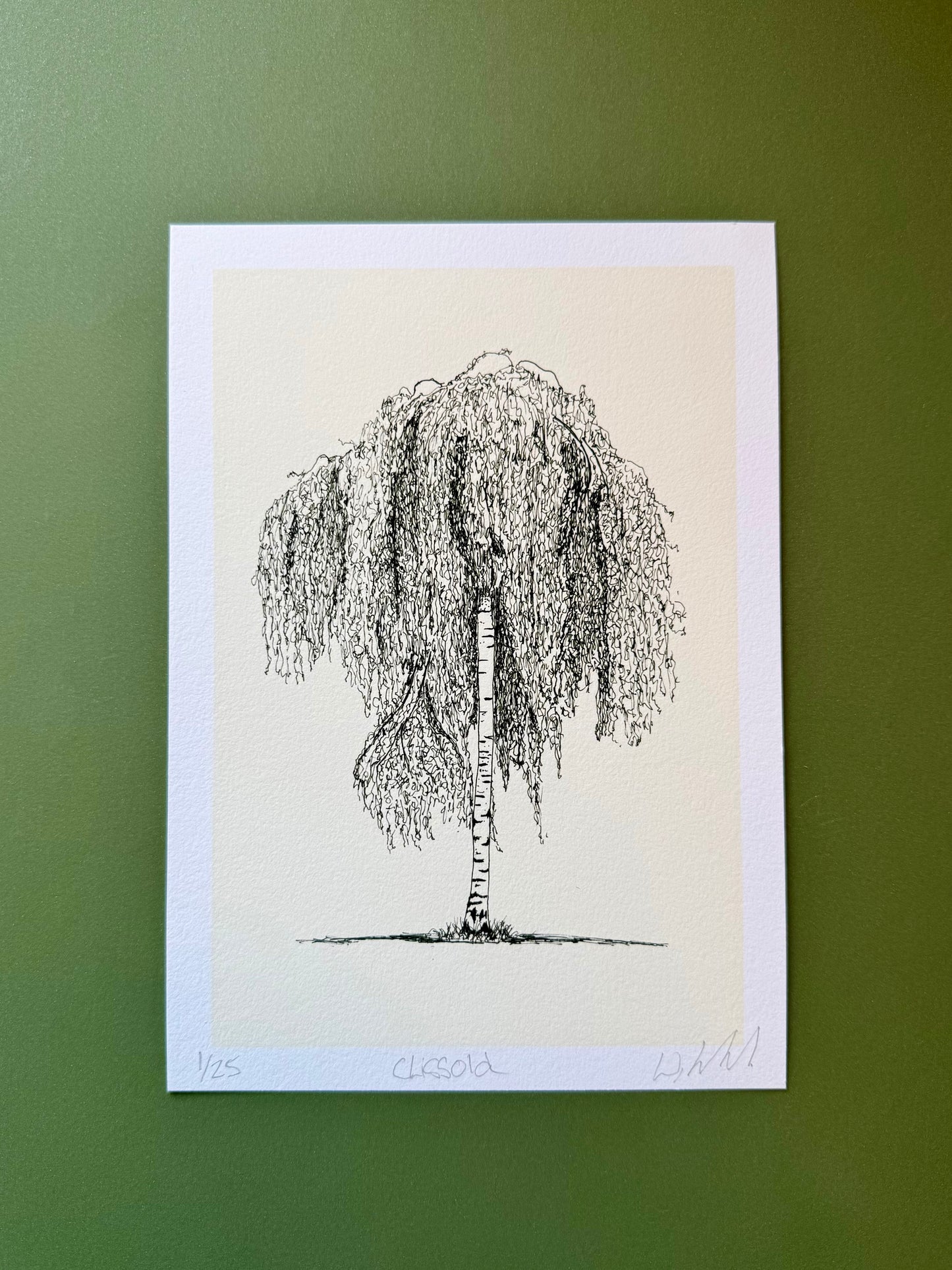 Framed black and white drawing of a willow tree on a beige background