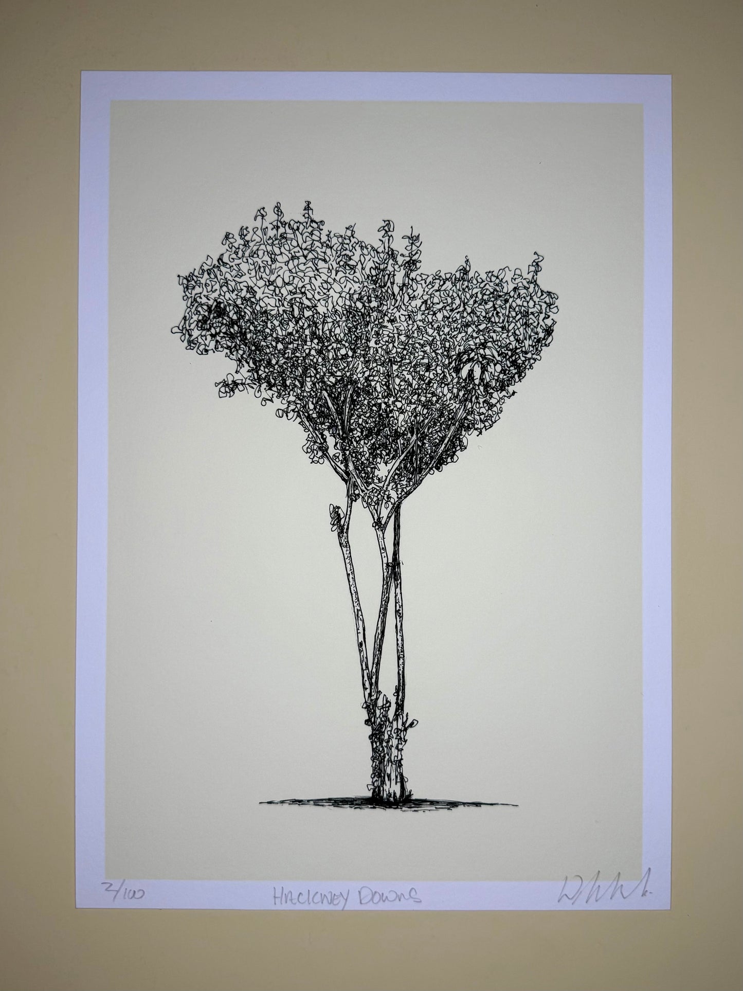 Black and white illustration of a tree on a beige background