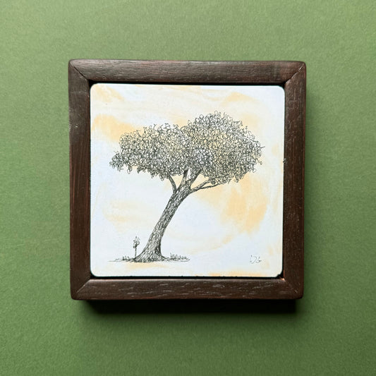 Original black ink drawing of a Hackney tree with a curved trunk and broad, densely detailed canopy. Drawn on hand-cast pigmented Portland cement with soft orange and pale blue tones, presented in a dark wooden frame against a green background.